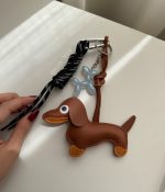 بگ چارم ( آویز کیف و کوله ) طرح سگ مشکی و قهوه ای 🐕 - Image 3