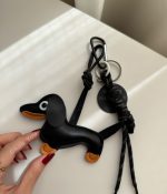 بگ چارم ( آویز کیف و کوله ) طرح سگ مشکی و قهوه ای 🐕 - Image 4