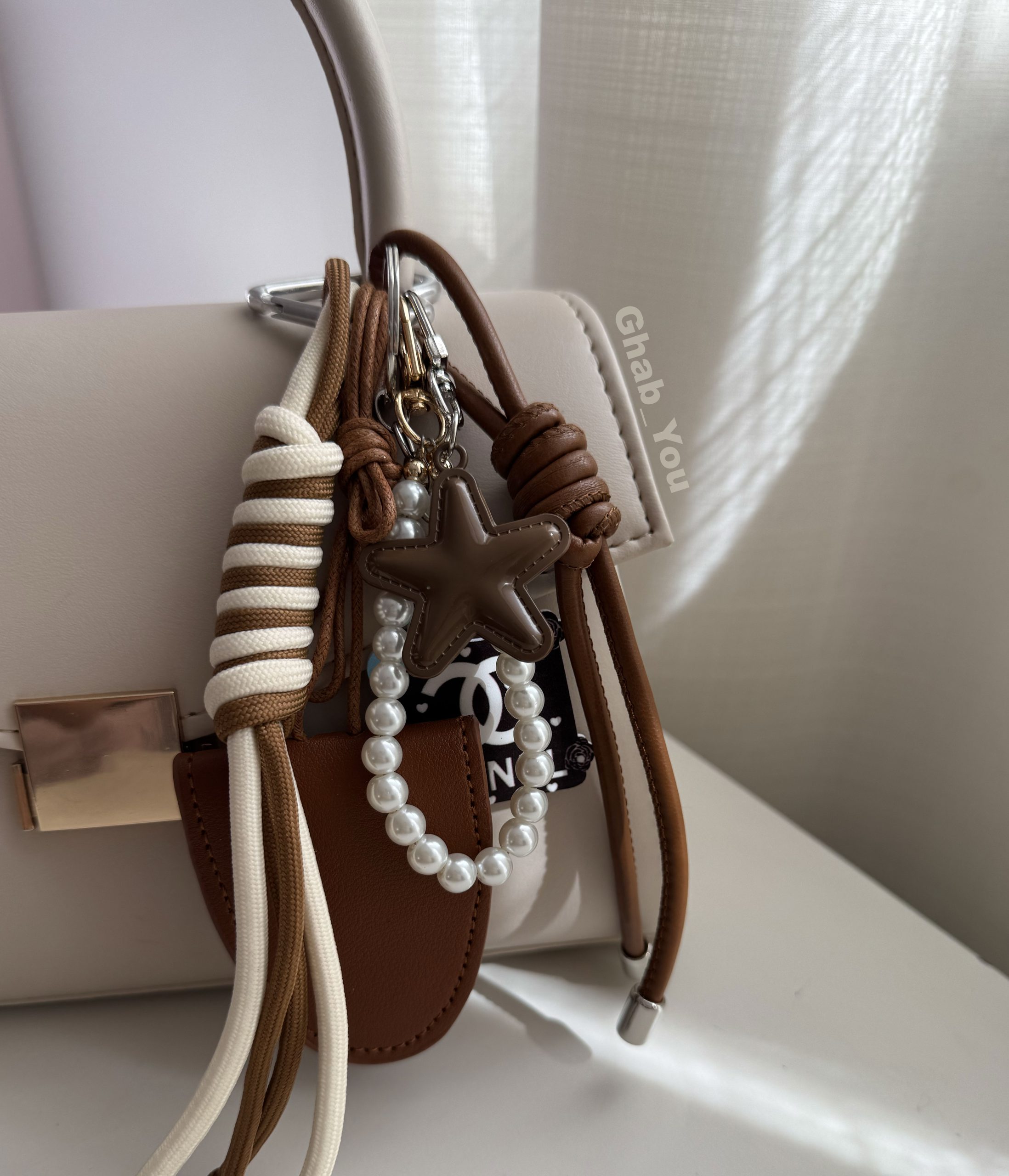 BagCharm-sun بگ چارم ( آویز کیف و کوله ) طرح جاعینکی قهوه ای 🤎 - Image 1